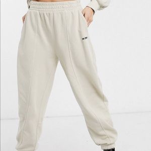 BERSHKA no item slogan oversized jogger in beige